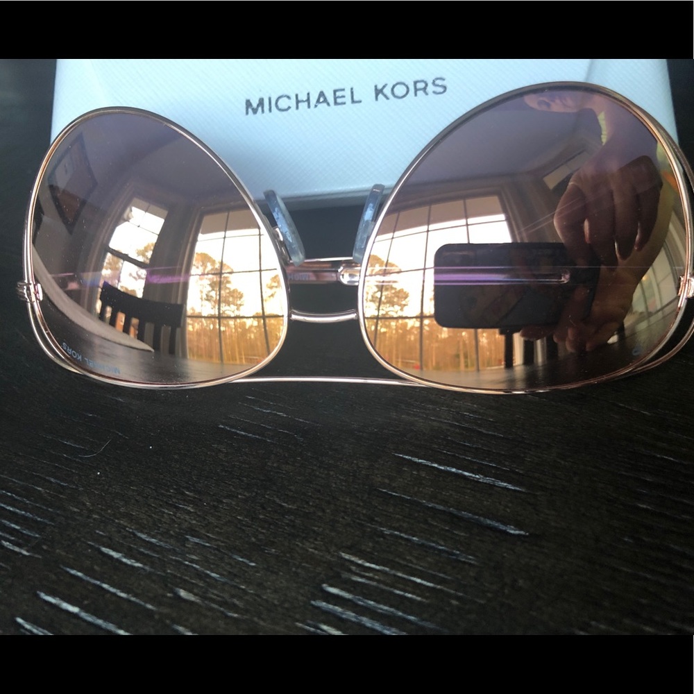 Michael Kors Rose Gold Polarized sunglasses.